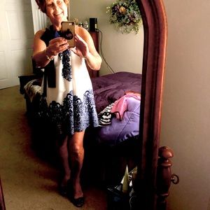 Boutique designer dress, tie at shoulder design